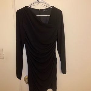Black Zara long sleeve dress with asymmetrical neck detail.